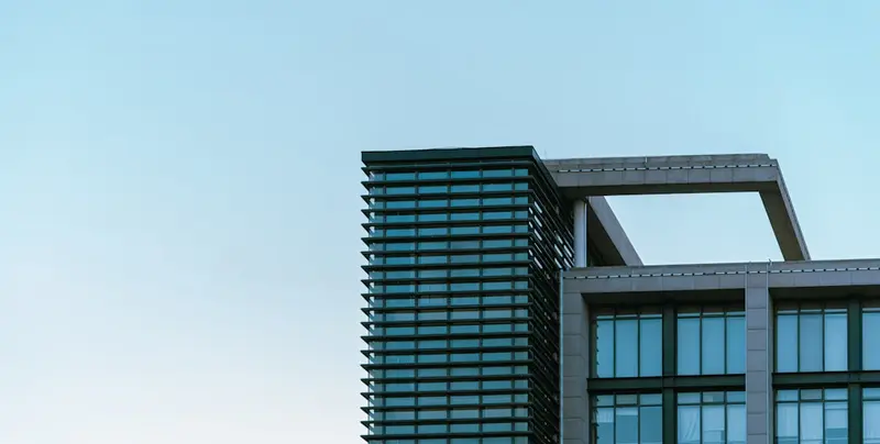 a very tall building with a sky in the background